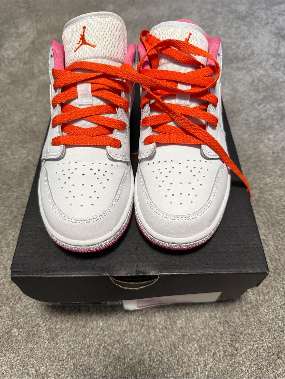 Jordan Kids White Sneakers with Pink Trim and Orange Laces